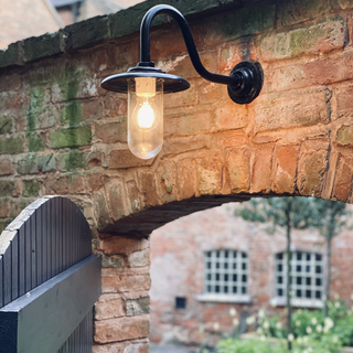 light gateways with overhanging light and outdoor wall lighting
