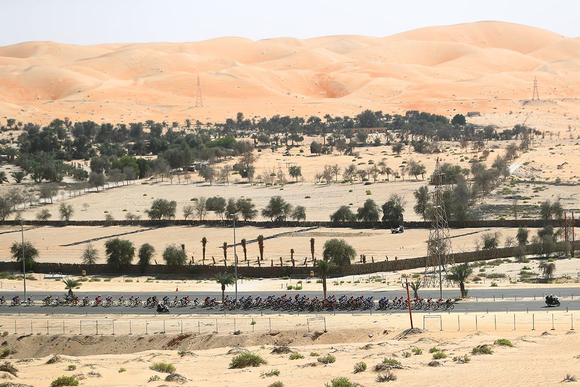 The peloton riding through the Abu Dhabi desert