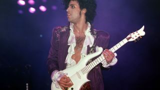 Prince (1958-2016) performs onstage during the 1984 Purple Rain Tour on November 4, 1984, at the Joe Louis Arena in Detroit, Michigan.