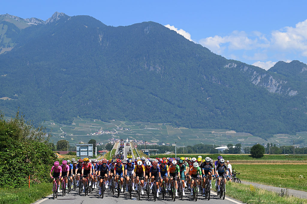GENEVA, SWITZERLAND - AUGUST 02: A general view of the peloton passing through a landscape during the 5th Tour de France Femmes 2026, Stage 2 a 147.9km stage from Aigle to Geneva / #UCIWWT / on August 02, 2026 in Geneva, Switzerland. (Photo by Tim de Waele/Getty Images)