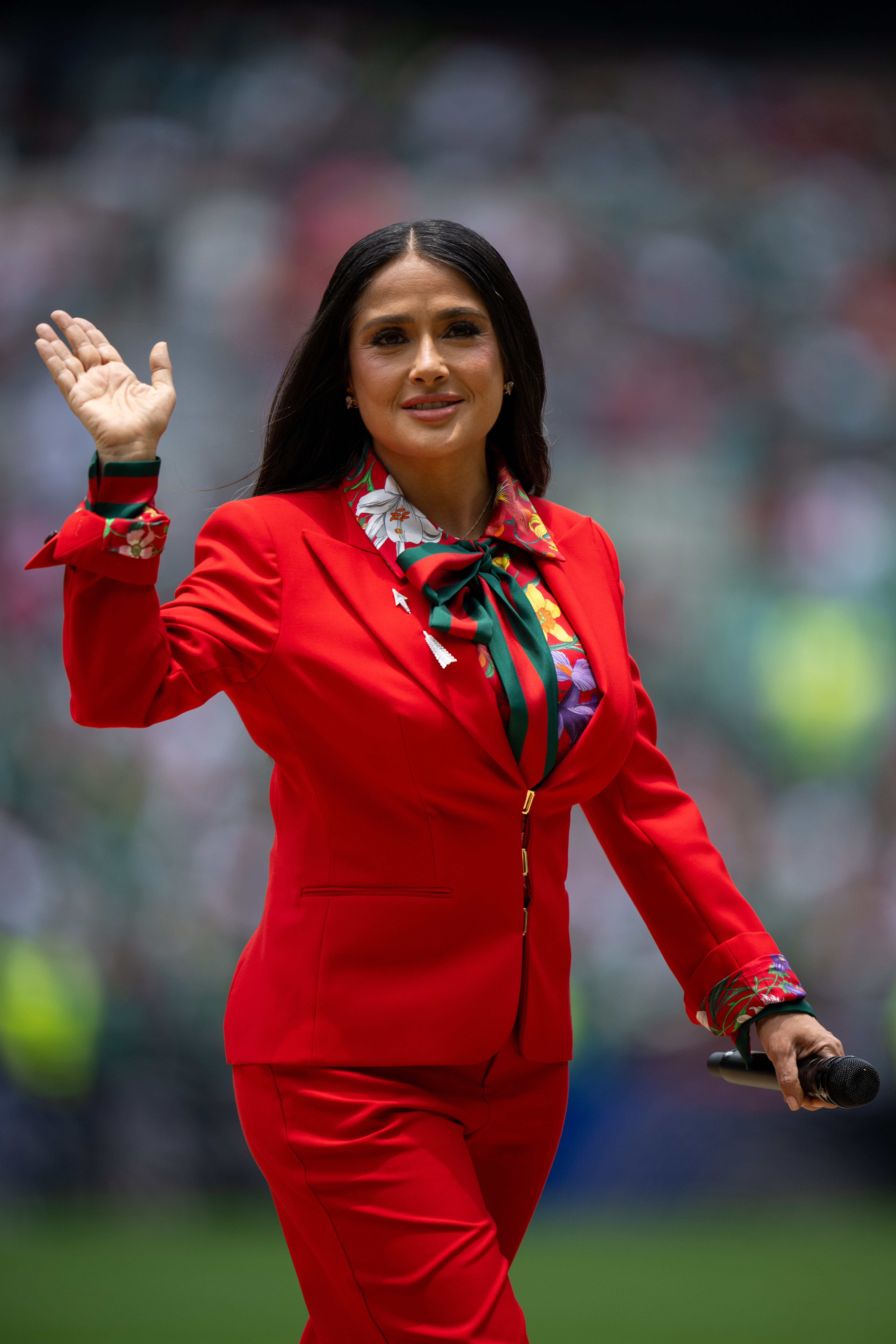 Salma Hayek opened the 2026 World Cup in a custom strawberry red suit from Gucci