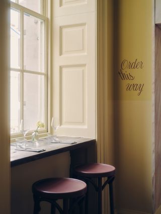 Window seating area at Café Petiole, London