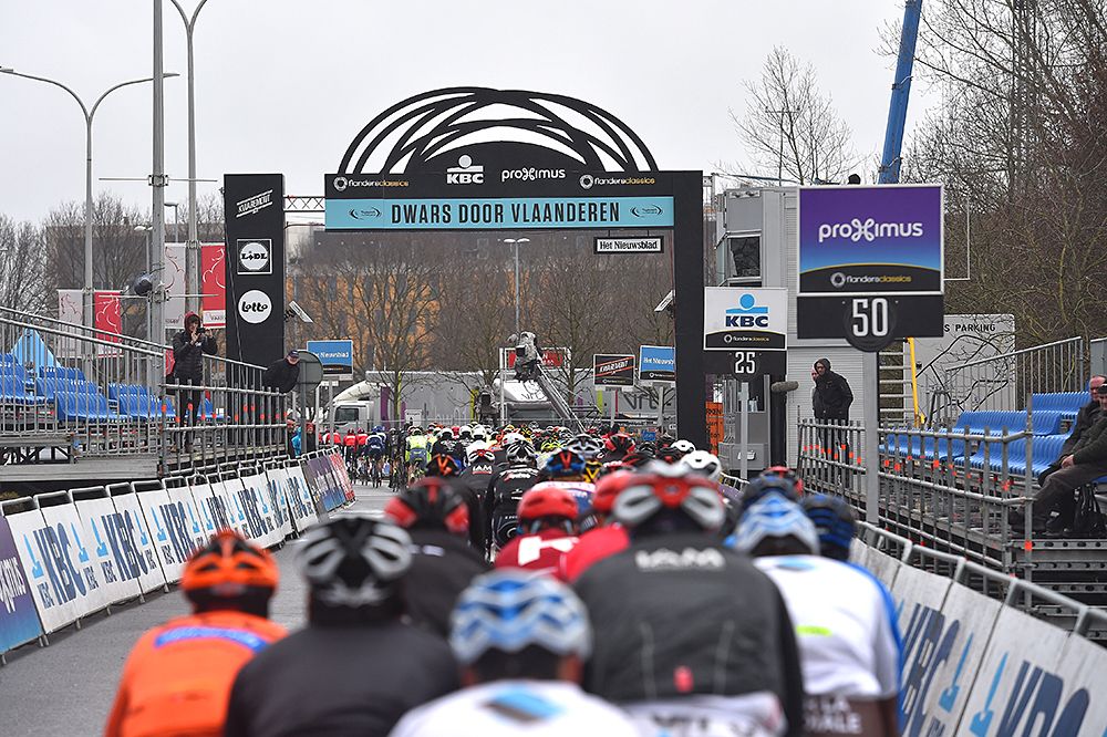 Riders line up at the start line in Roeselare City for Dwars door Vlaanderen