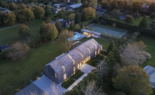 night time aerial of timber Hamptons house
