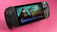 A handheld gaming console displays the start screen of "Vampire Crawlers," featuring a vampire holding a wine glass. Background is vibrant pink.