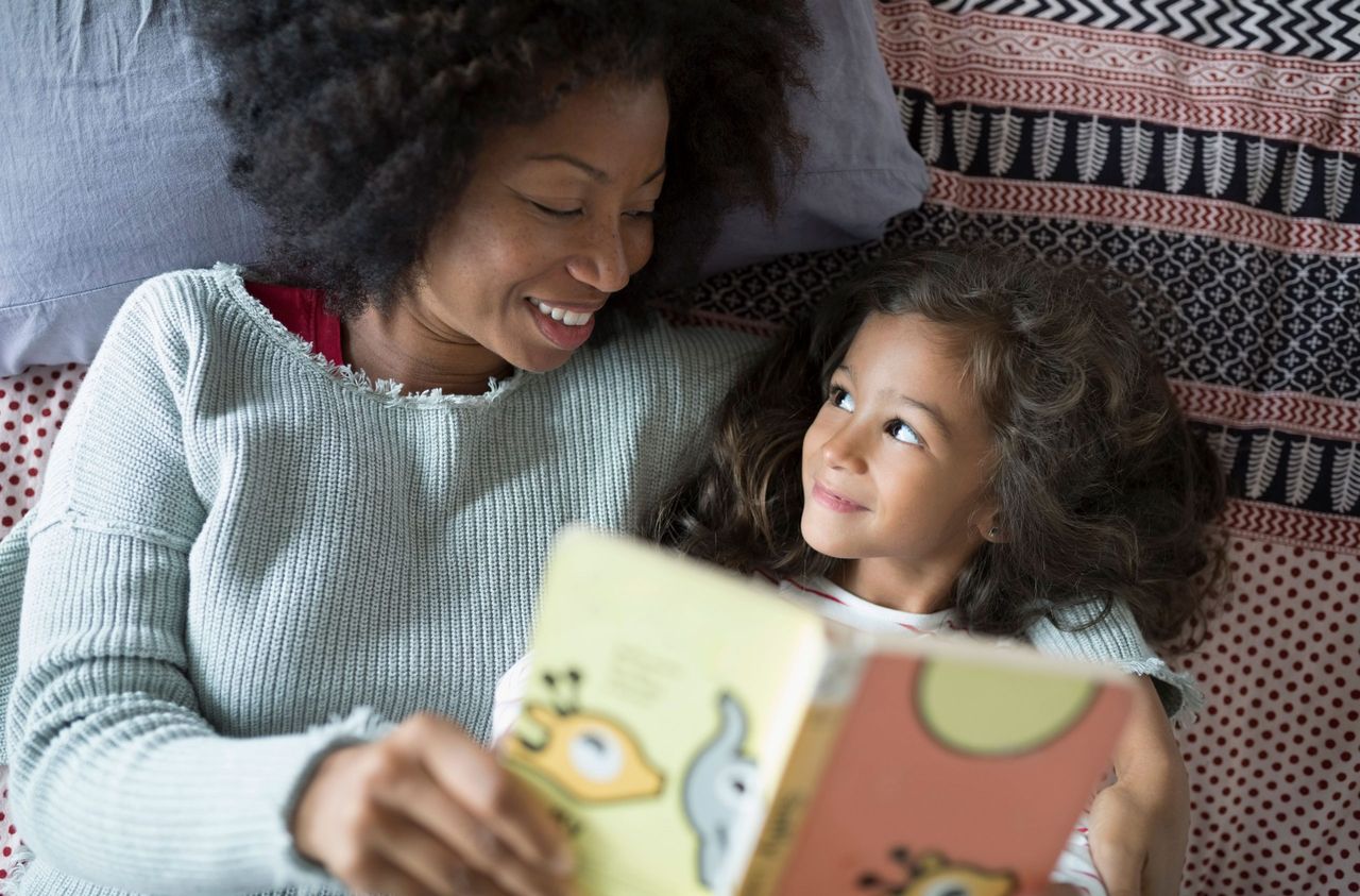 mum and daughter reading