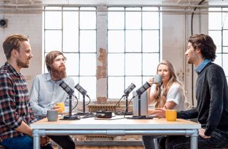 Best podcasting microphones: four people record a podcast