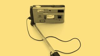 The Minolta 7 Disc camera mounted on its selfie stick