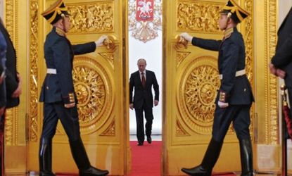 Vladimir Putin enters St. Andrew's Hall in the Grand Kremlin Palace to take the oath of office on May 7, 2012.