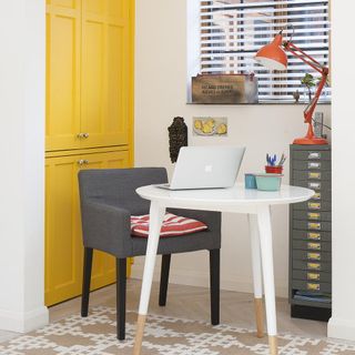 room with yellow cupboard