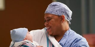 Bailey holding Amelia's baby