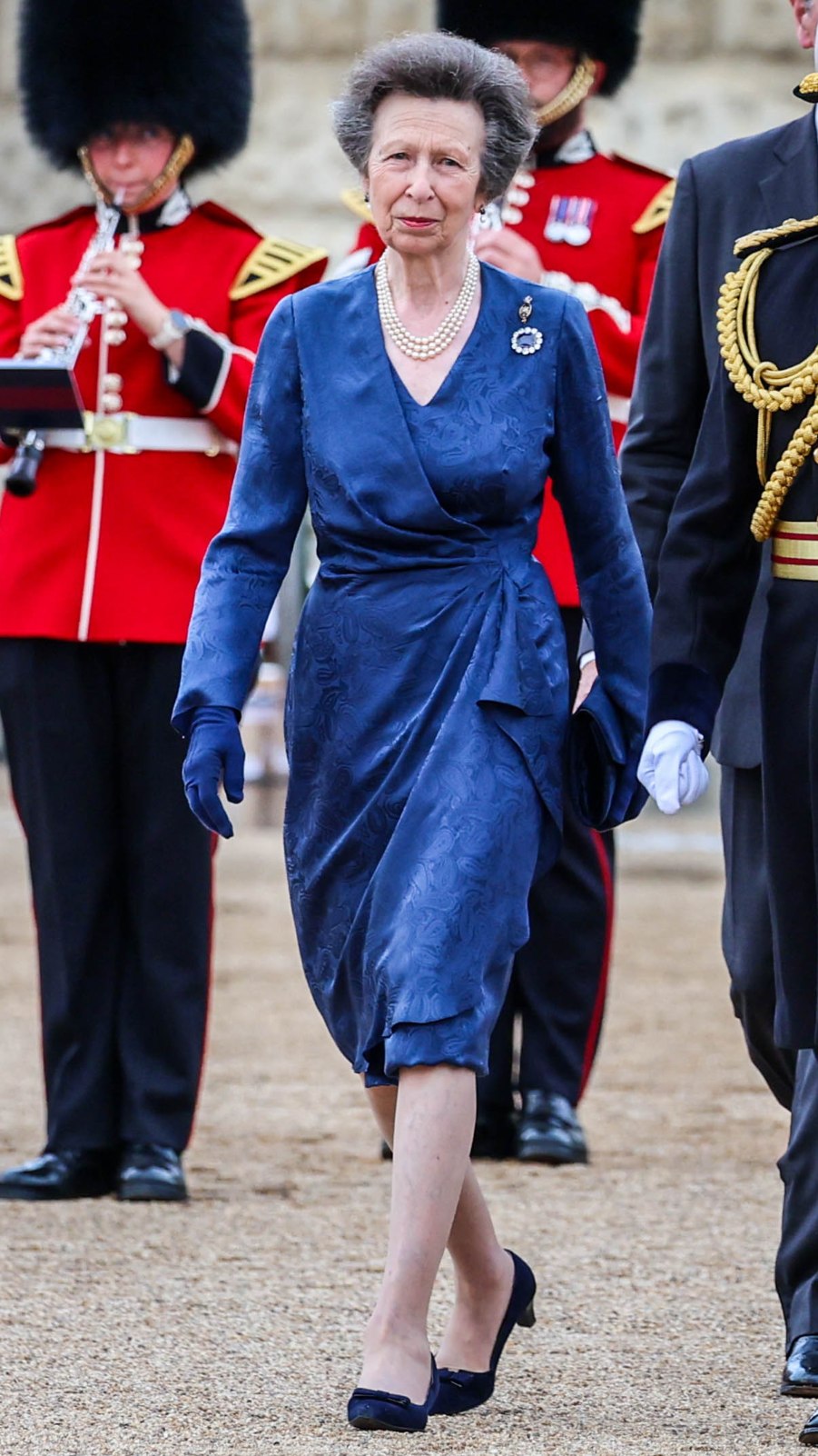Princess Anne, Princess Royal walks forward during the Household Division Musical Spectacular 2025