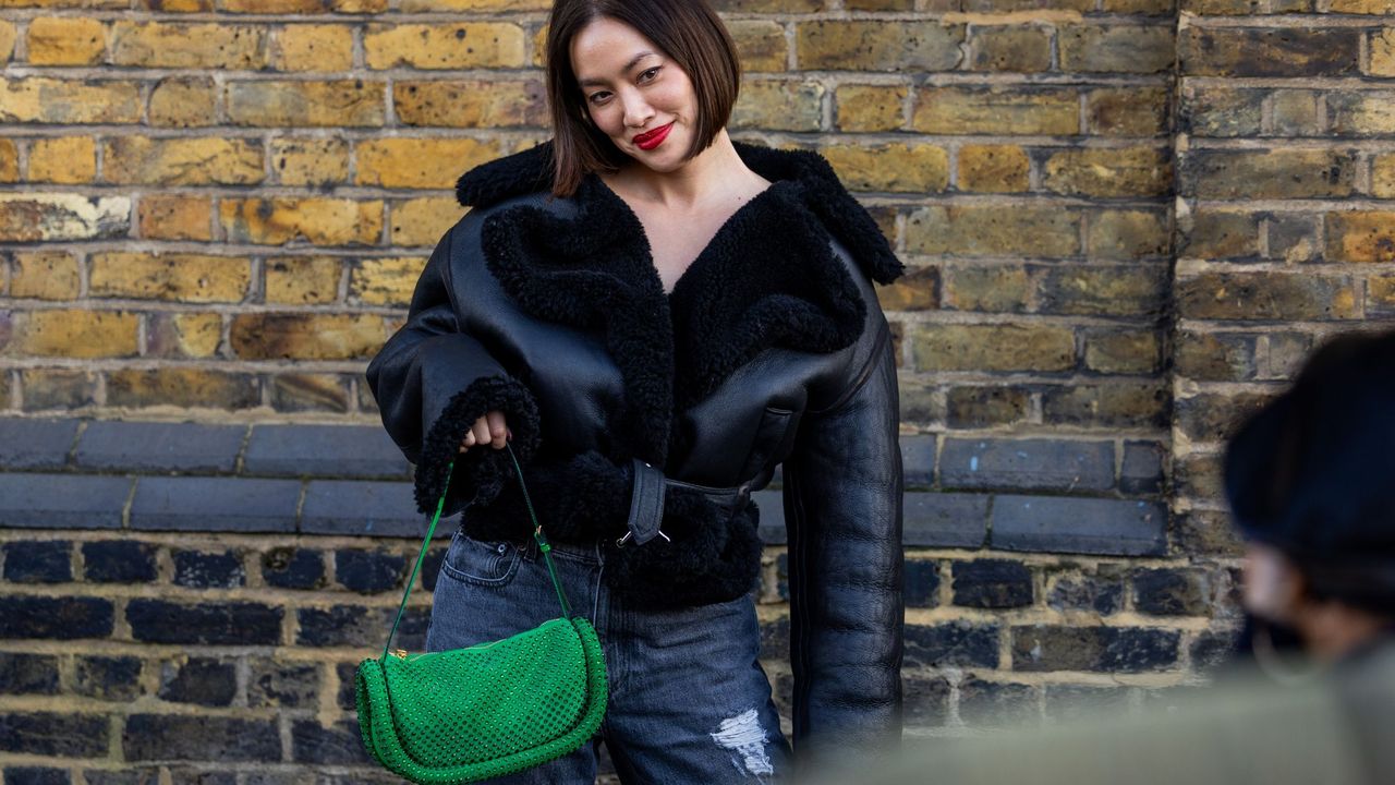 Fashion week attendees carrying the JW Anderson Bumper bag