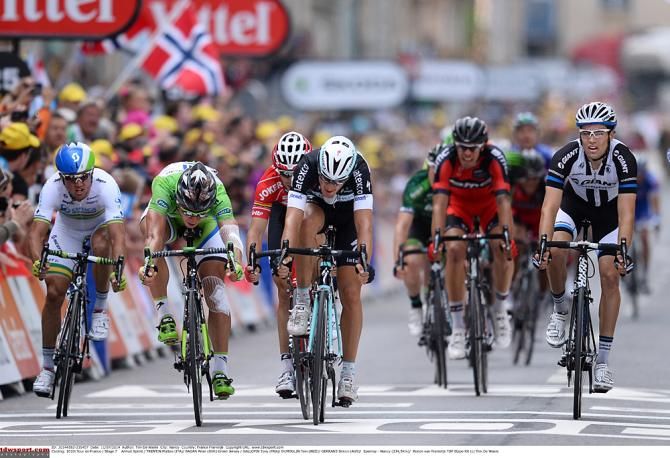 Sagan and Trentin throw their bikes at the stage 7 finish line