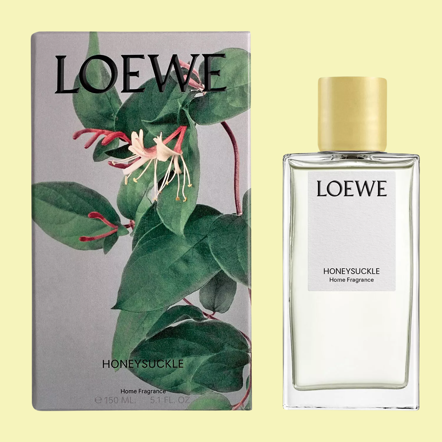 A bottle of room spray beside floral packaging