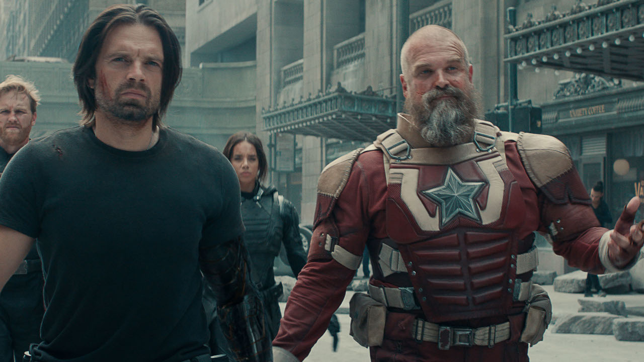Bucky Barnes (Sebastian Stan) and Alexei Shostakov (David Harbour) walk with their teammates in Thunderbolts*