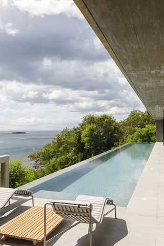 Concrete House by the Ocean pool
