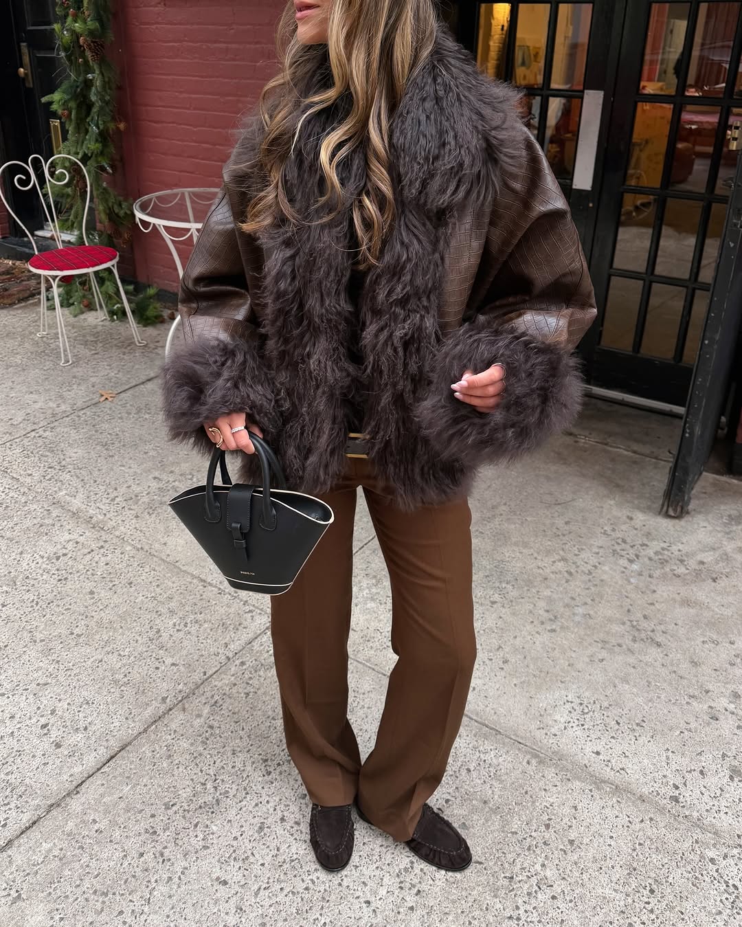 woman wearing brown faux fur coat 2026