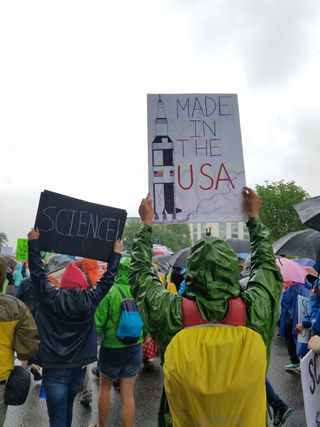 NASA's Saturn V moon rocket was indeed made in America as this sign proclaims during the March for Science in Washington D.C. on April 22, 2017.
