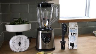 Tefal BL82AD40 PerfectMix+ Tritan blender on a kitchen countertop with fruit and oat milk
