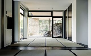The house shows influence of Japanese minimalist design.