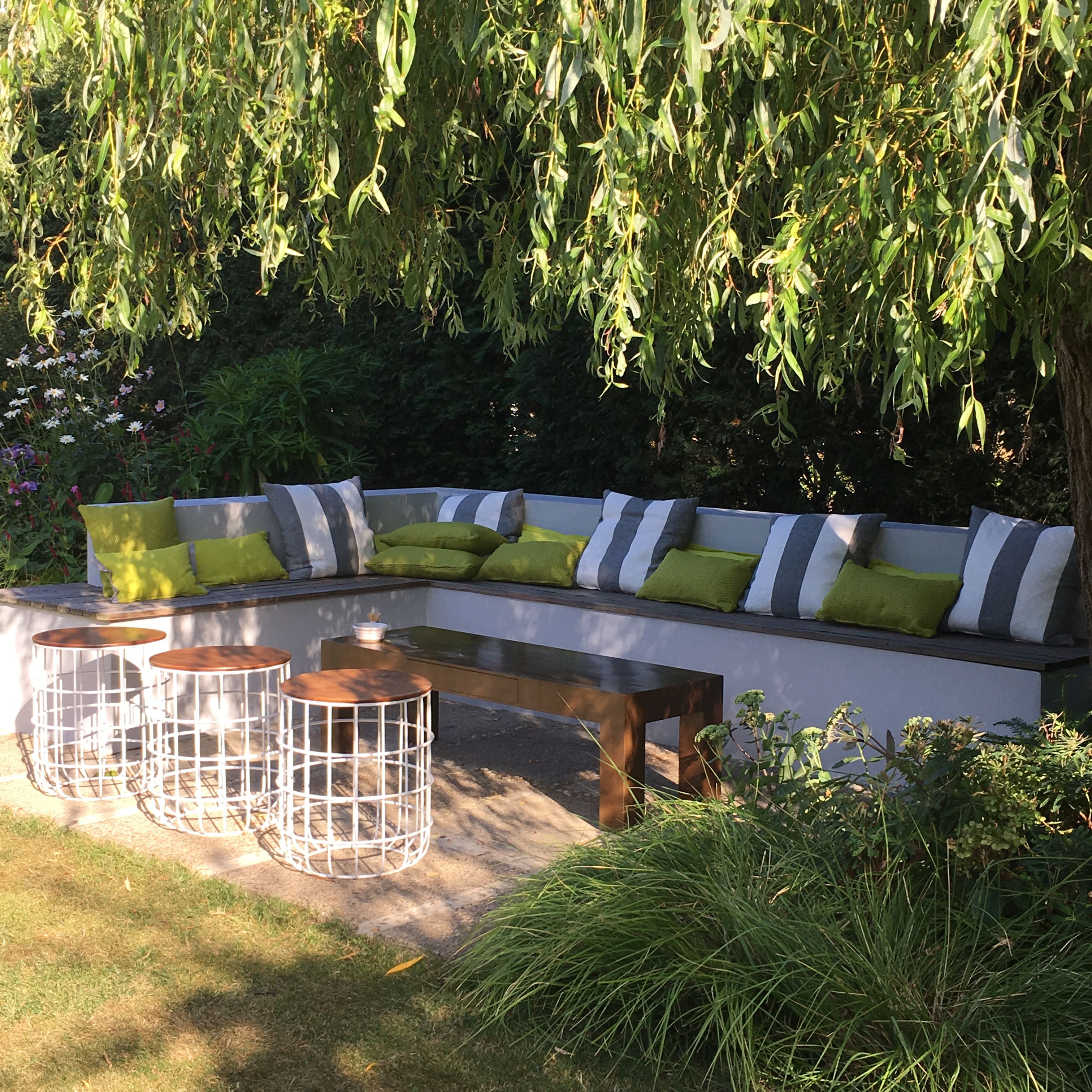 L-shaped built-in garden seating area