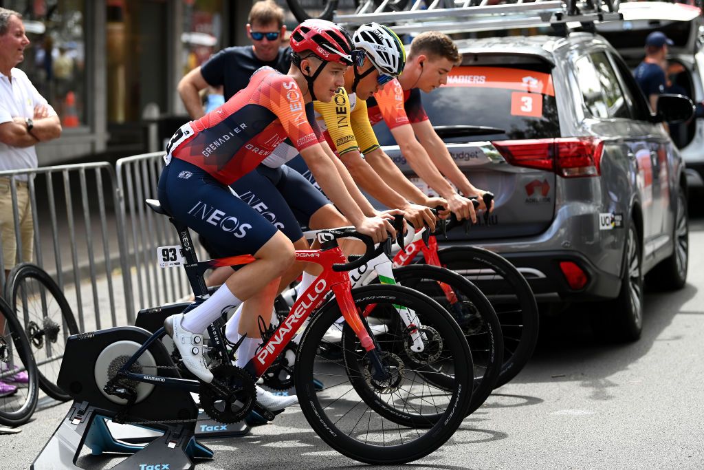 NORWOOD AUSTRALIA JANUARY 20 LR Leo Hayter of The United Kingdom Luke Plapp of Australia and Kim Heiduk of Germany and Team INEOS Grenadiers warm up prior to 23rd Santos Tour Down Under 2023 Stage 3 a 1168km stage from Norwood to Campbelltown TourDownUnder WorldTour on January 20 2023 in Norwood Australia Photo by Tim de WaeleGetty Images