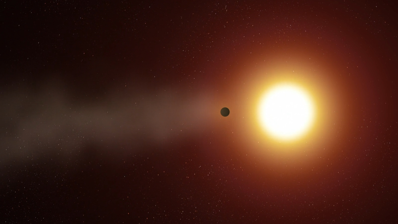 An artist's impression of a star blowing away an exoplanet's atmosphere