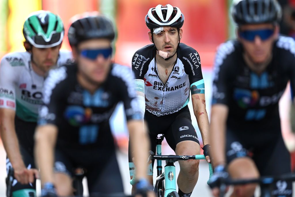 ALBACETE SPAIN AUGUST 18 Mikel Nieve Ituralde of Spain and Team BikeExchange crosses the finishing line injured after crash during the 76th Tour of Spain 2021 Stage 5 a 1844km stage from Tarancn to Albacete lavuelta LaVuelta21 on August 18 2021 in Albacete Spain Photo by Stuart FranklinGetty Images