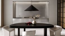A kitchen with a minimalist design, in stainless steel
