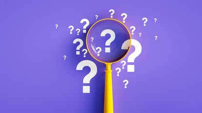 A magnifying glass rests on a purple background among several question marks.