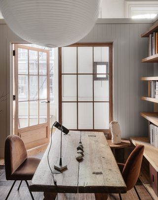 minimalist home office with wooden table