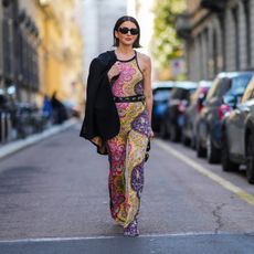 woman wearing a multi-colored jumpsuit