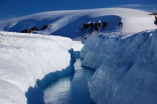 Ice channel or supraglacial melt channel. This was formed by meltwater flowing along the surface of the glacier. Belcher Glacier, Devon Island, Nunavut, Canada.