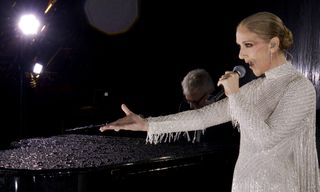 This handout released by the Olympic Broadcasting Services, shows a view of singer Celine Dion performing on the Eiffel Tower during the opening ceremony of the Paris 2024 Olympic Games Paris 2024 on July 26, 2024 in Paris, France. (Screengrab by IOC via Getty Images)