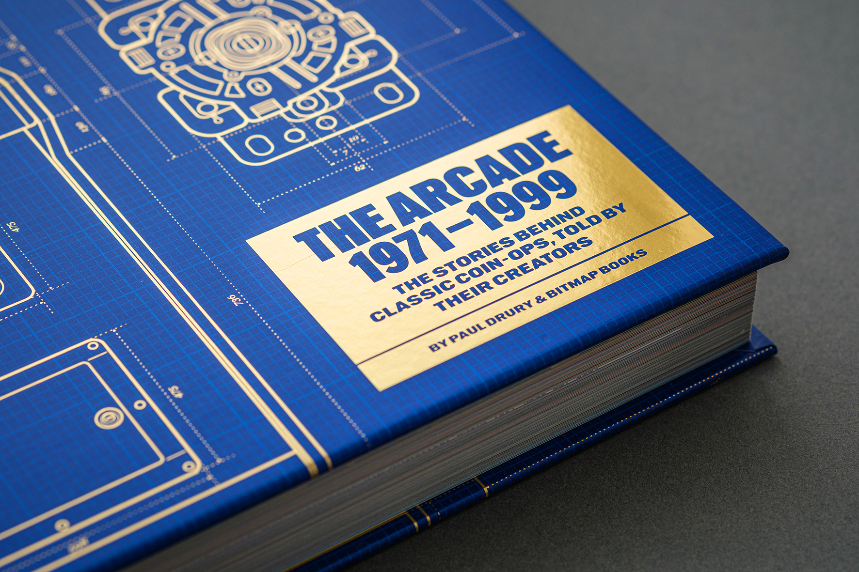 A blue book with gold foil
