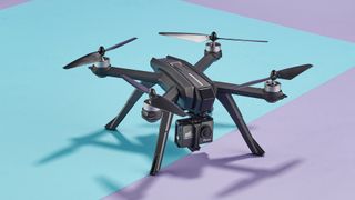 The Potensic D85 drone photographed on a blue and purple background