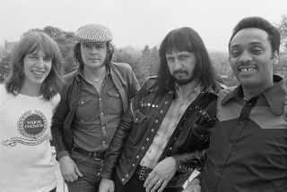Entwistle’s band for his third solo album, 1973’s Rigor Mortis Sets In: (l-r) Graham Deakin, Tony Ashton, Entwistle, Eddie Jones