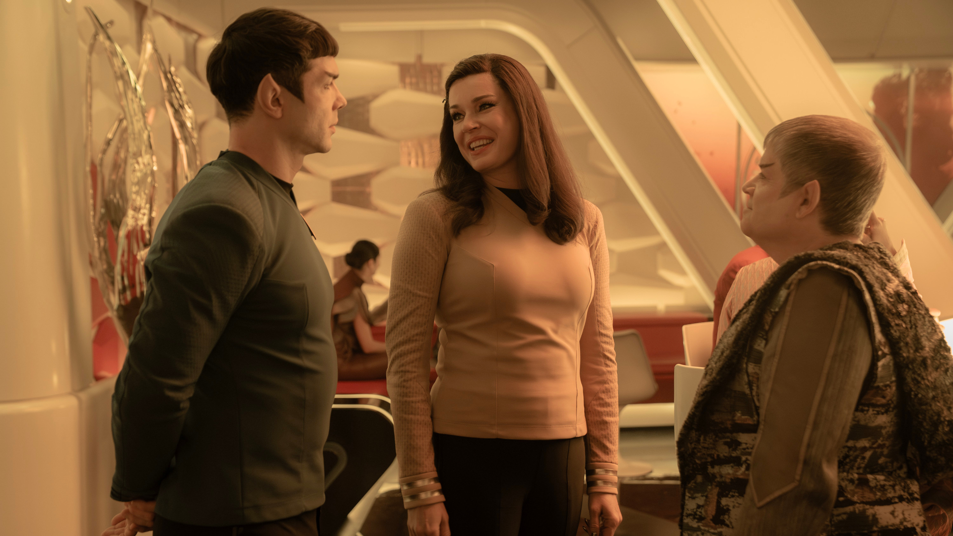 L to R Ethan Peck as Spock, Rebecca Romijn as Una and Patton Oswalt as Doug in season 3 , Episode 8 of Strange New Worlds streaming on Paramount+. Photo Credit: Marni GrossmanParamount+