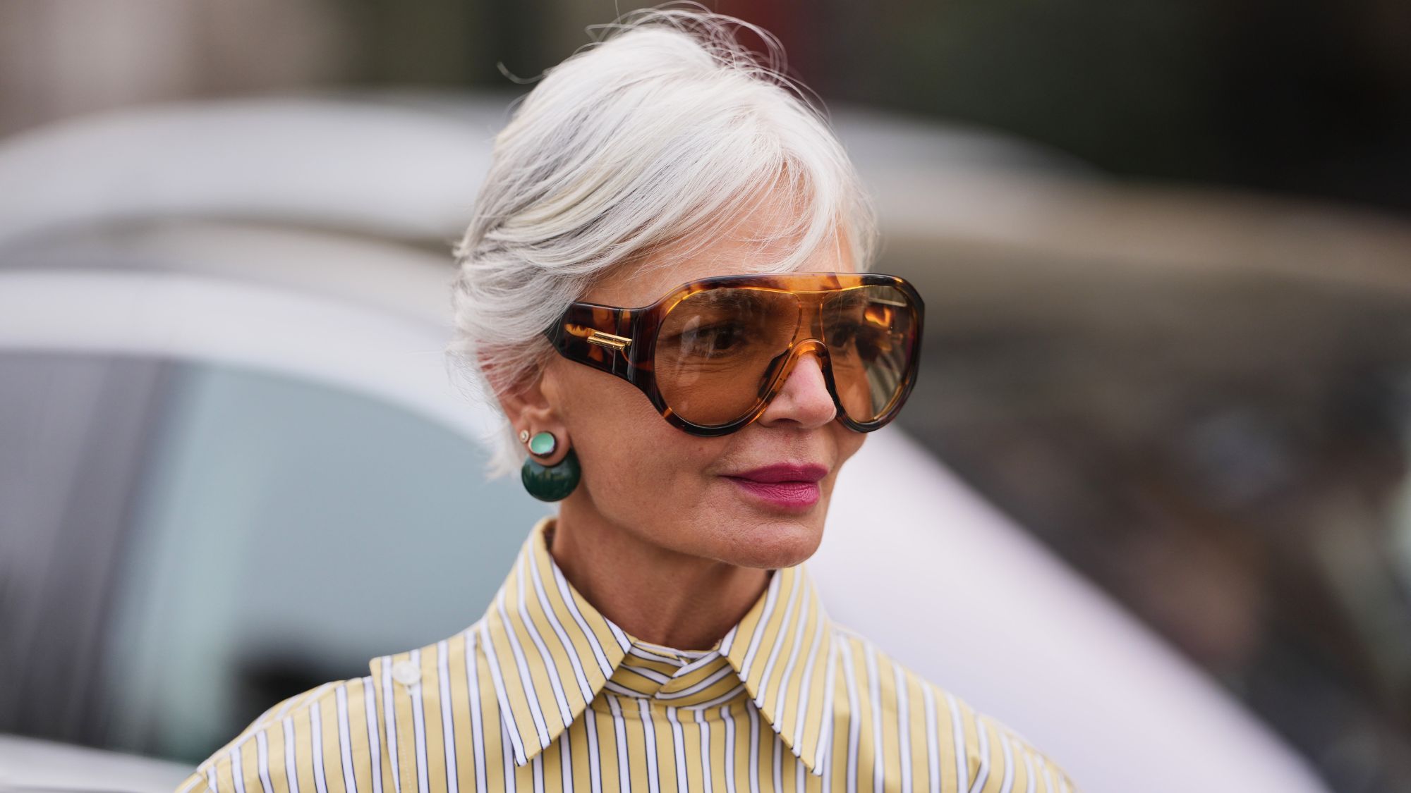 grece ghanem headshot wearing oversized sunglasses