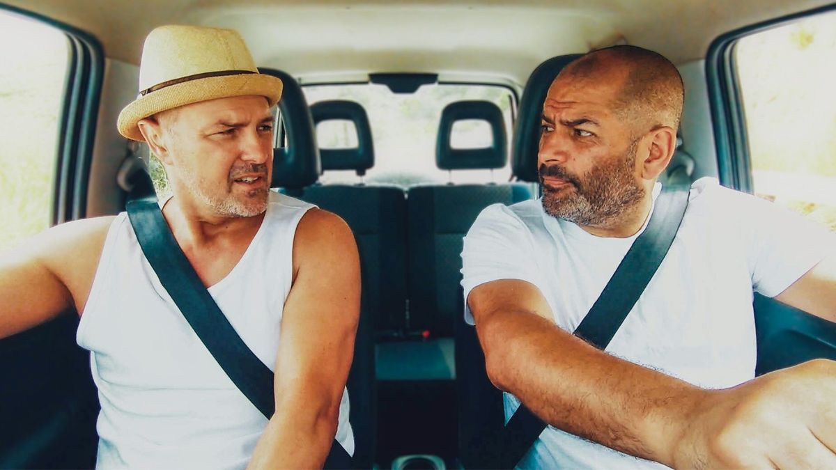 Paddy McGuinness and Chris Harris riding inside their camper in Paddy and Chris: Road Tripping