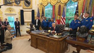 President Donald Trump welcomed the four Artemis 2 astronauts (in blue flight suits) and NASA Administrator Jared Isaacman (in dark suit, in front of American flag) to the Oval Office on April 29, 2026.