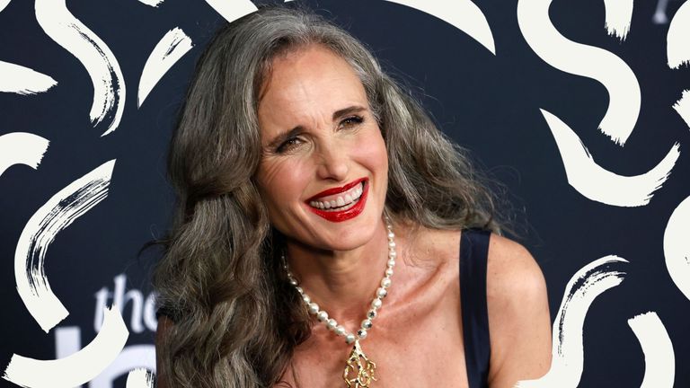 Actor Andie Macdowell, pictured in a black dress with red lipstick after transitioning to gray hair