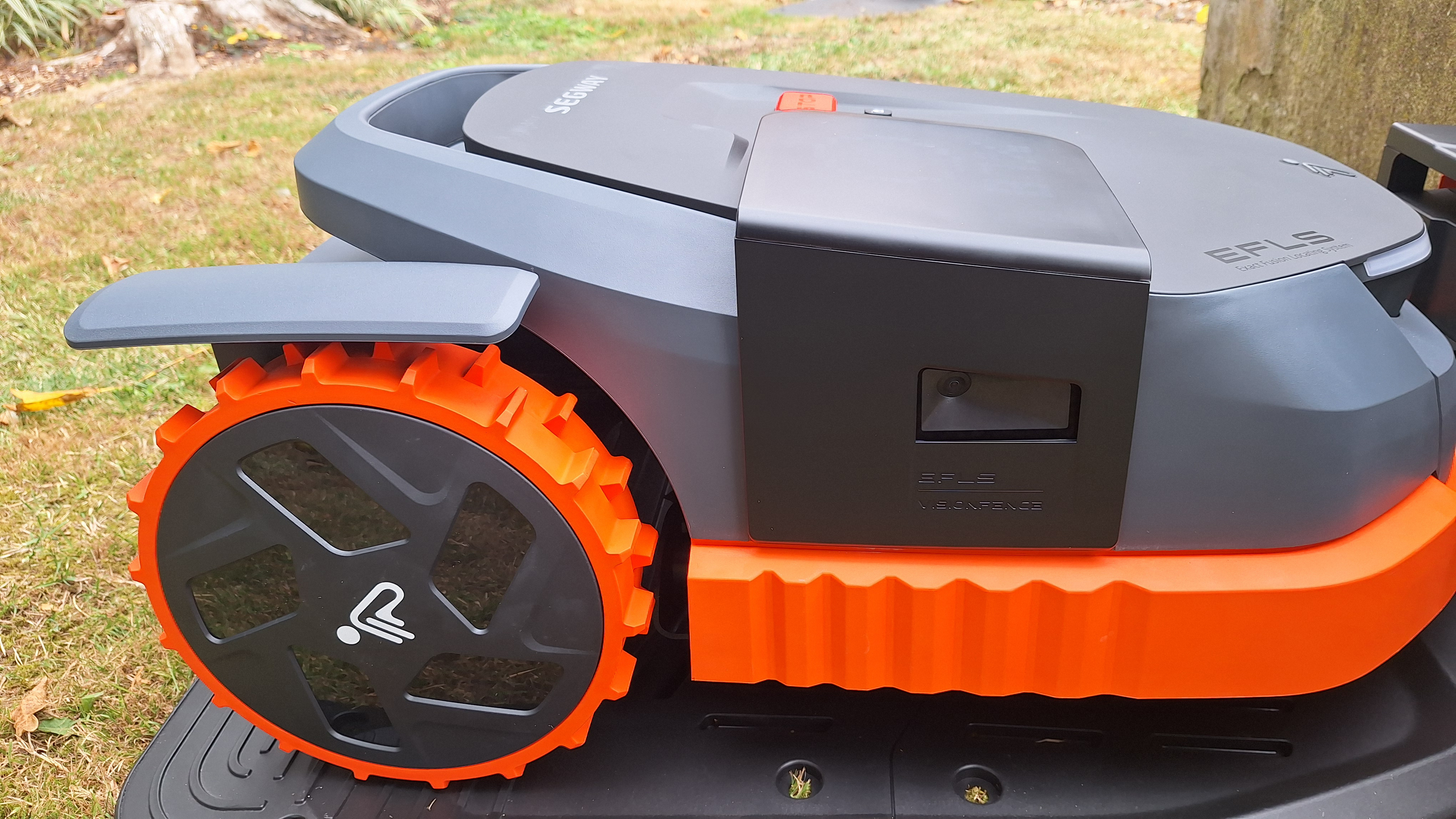 Segway Navimow X350 robot lawn mower photographed side on in tester&#039;s yard