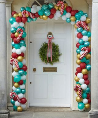 Christmas porch with balloon arch