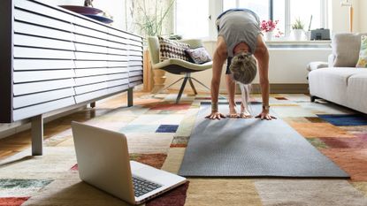 Senior woman doing an online workout