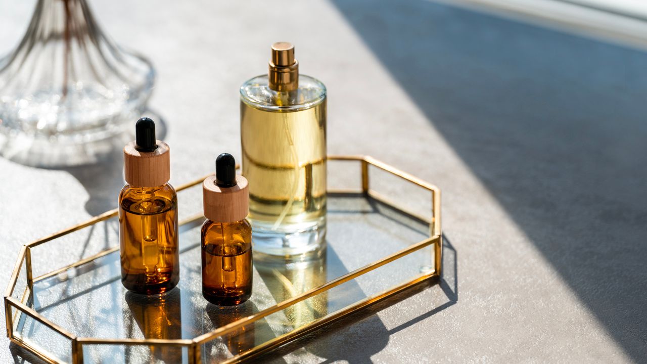 Tray of perfume and serum bottles