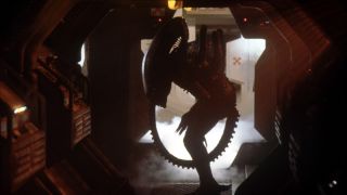 Scene from the movie Alien. The xenomorph alien stands up, filling the spaceship corridor.