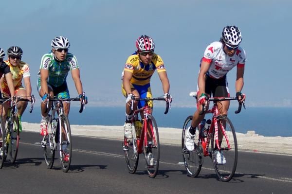 Marco Arriagada (T-Banc Sketchers) rides in the main paceline.