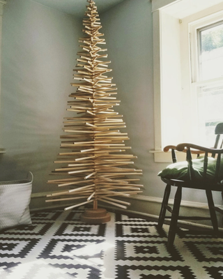 A Wooden Christmas tree made of 2x4s